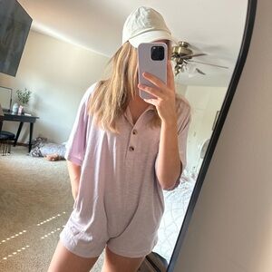 Woman’s pink romper